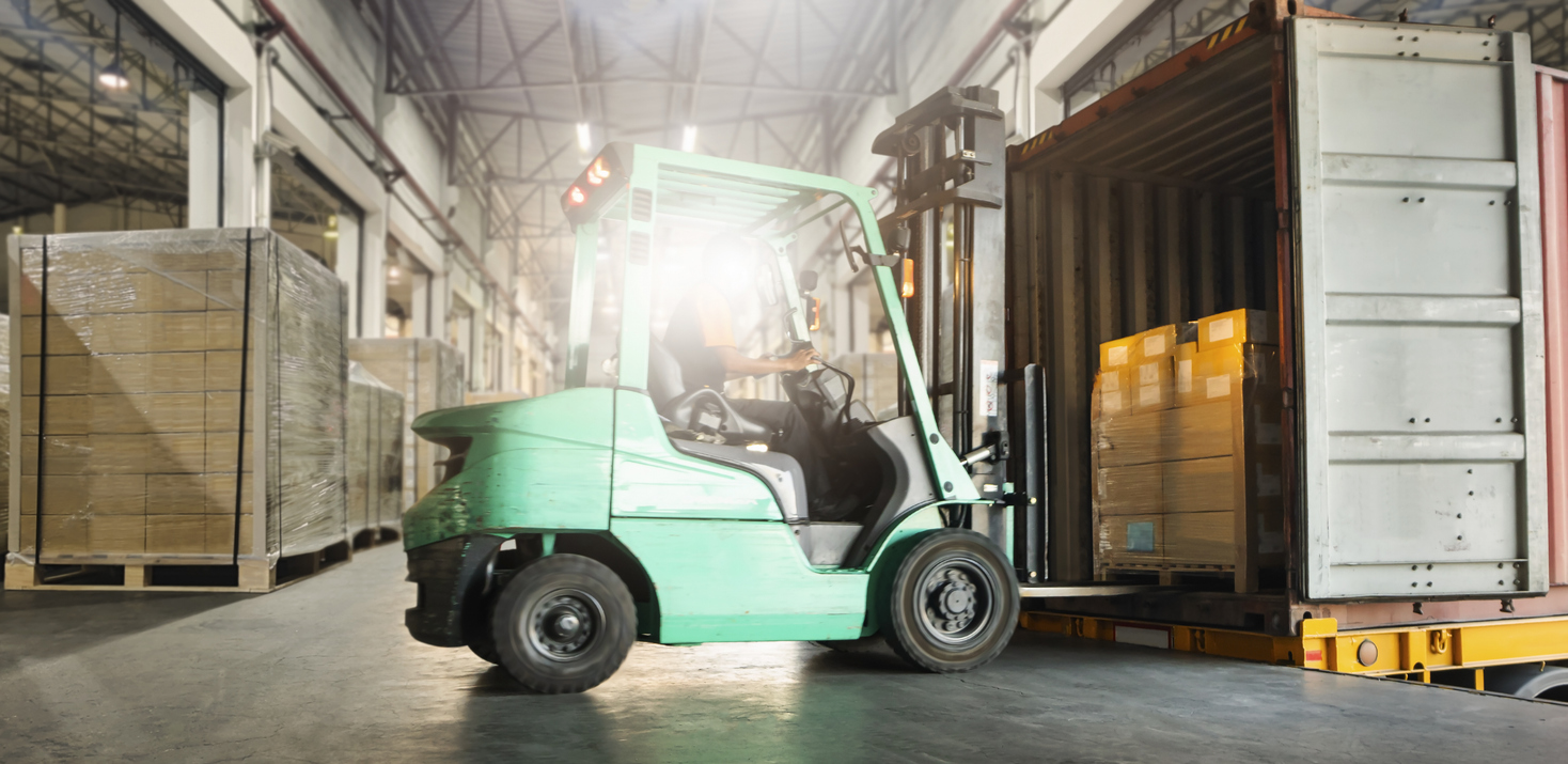 Forklift Tractor Loading Packaging Boxes into Container Trucks. Forklift Pallets Truck, Loader. Cargo Sending to Customers. Shipment Supplies Warehouse. Freight Truck Transport Logistics